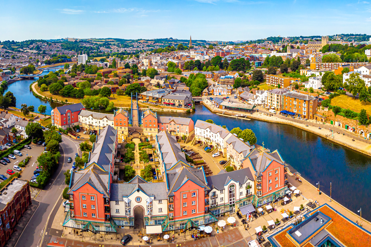 An aerial photograph showing the River Exe running through the picturesque and colourful city of Exeter.