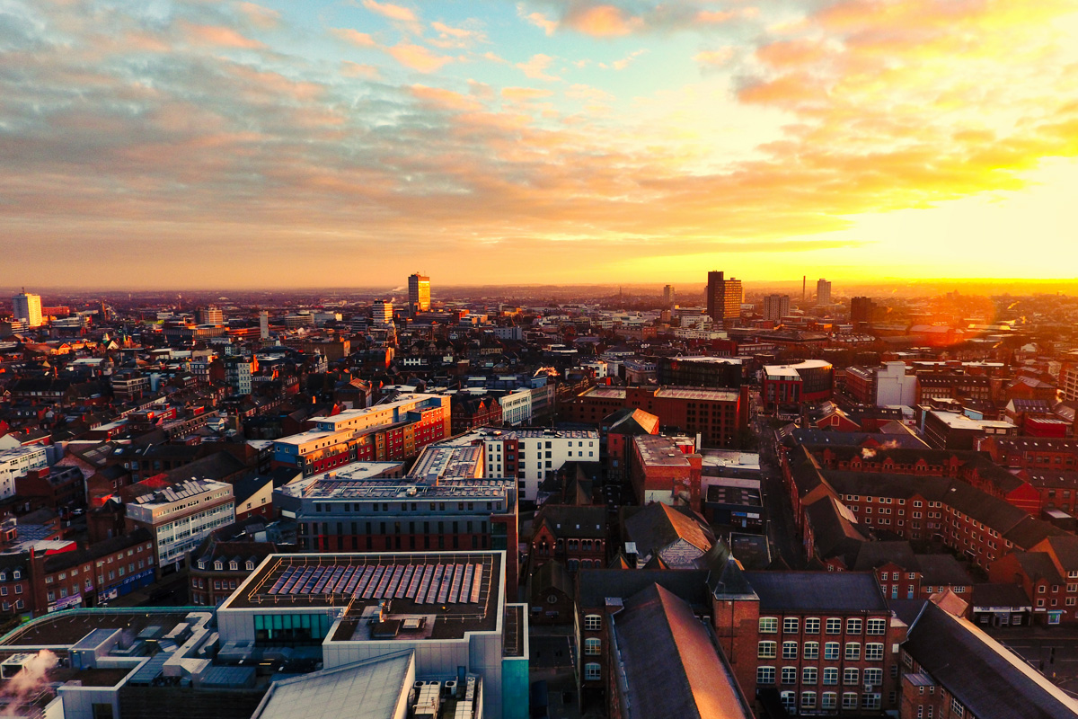 The sun rises over Leicester. An aerial view of the city.
