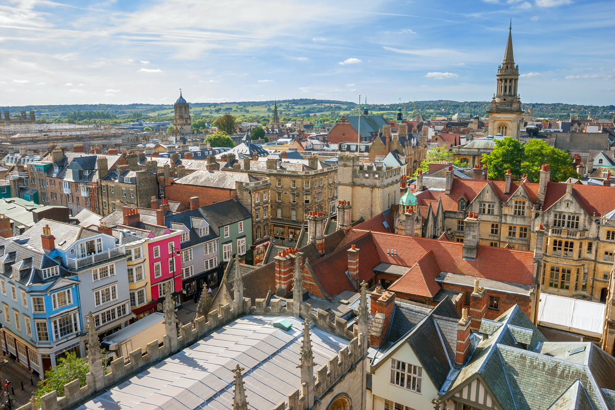 A raised view of roof tops across the historic city of Oxford.