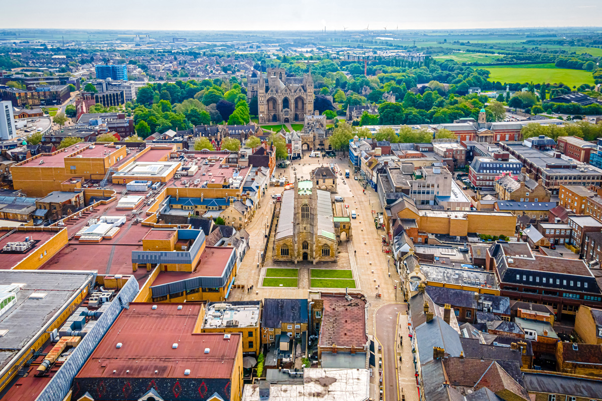 An aerial view of the city of Peterborough. Peterborough Cathedral, also known as Saint Peter's Cathedral can be seen in the background.