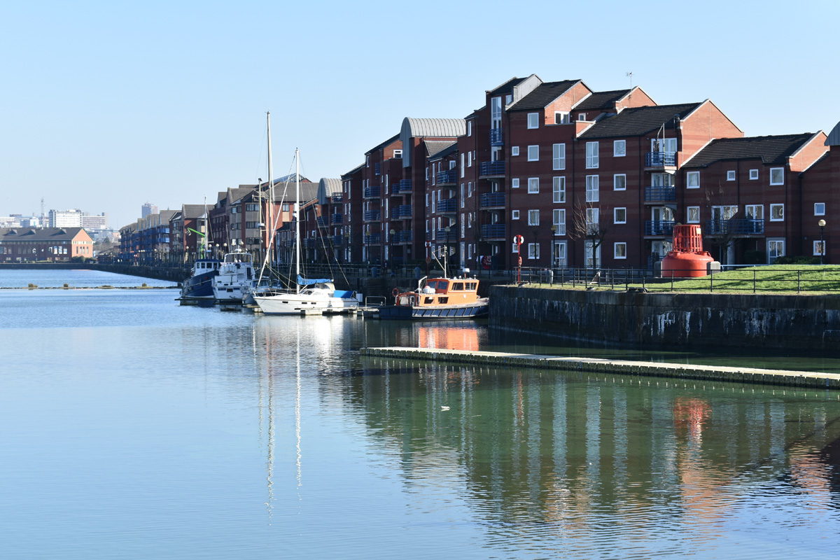 Residential apartment buildings at Princes Reach, Ashton-on-Ribble at the Preston Riversway Docklands. Blocks of flats, alongside the River Ribble in Preston, on a clear summer day.