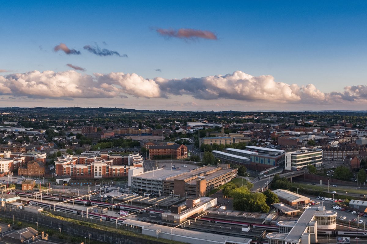 A drone shot, aerial view of the the city of Wolverhampton with the train station clearly visible.